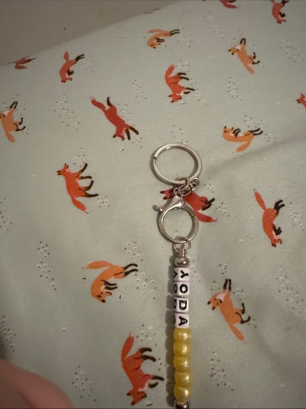 Yellow star wars yoda keychain